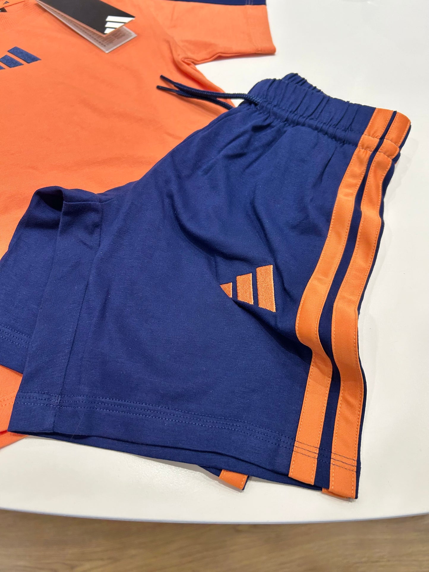 Completo blu/arancione