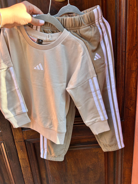 Tuta beige marrone