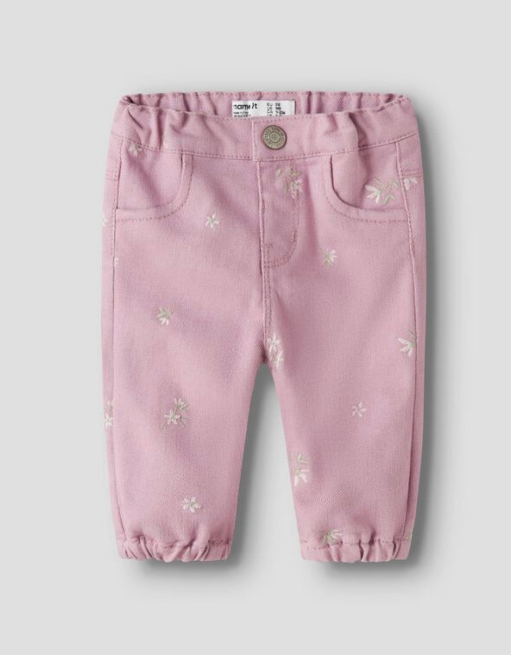 Jeans con fiori ricamati
