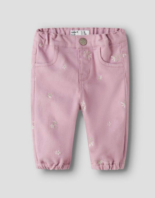 Jeans con fiori ricamati